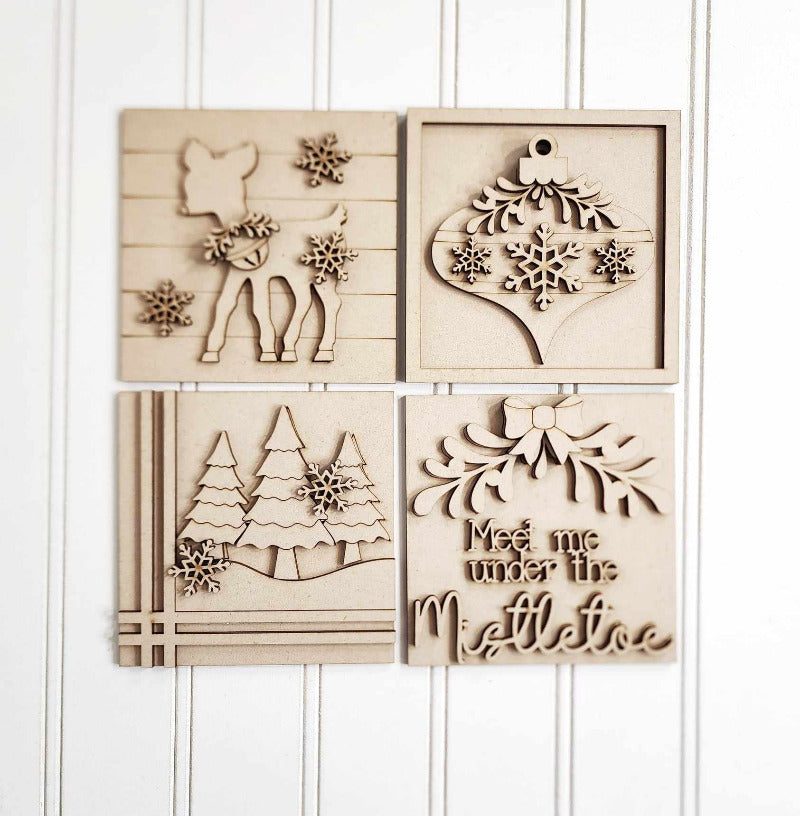 Set of wooden Christmas-themed cutouts on a white background